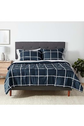 Picture of Amazon Basics Lightweight Microfiber Bed-in-a-Bag Comforter 7-Piece Bedding Set, Full/Queen, Navy with Grey Plaid