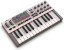 Picture of Akai Professional MPK Mini IV USB-C MIDI Keyboard Controller for Beginners and Producers - MPC Drum Pads, 360° Knobs, Pitch and Mod Wheels, Production Software, Native Instruments Sound Package, Grey